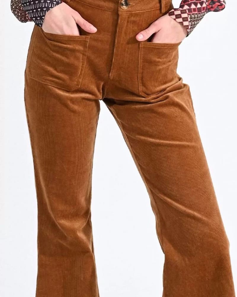 Back of a model wearing a size XLarge Flare Leg High Waisted Corduroys Pants In Camel in Camel by MOLLY BRACKEN. | dia_product_style_image_id:353710